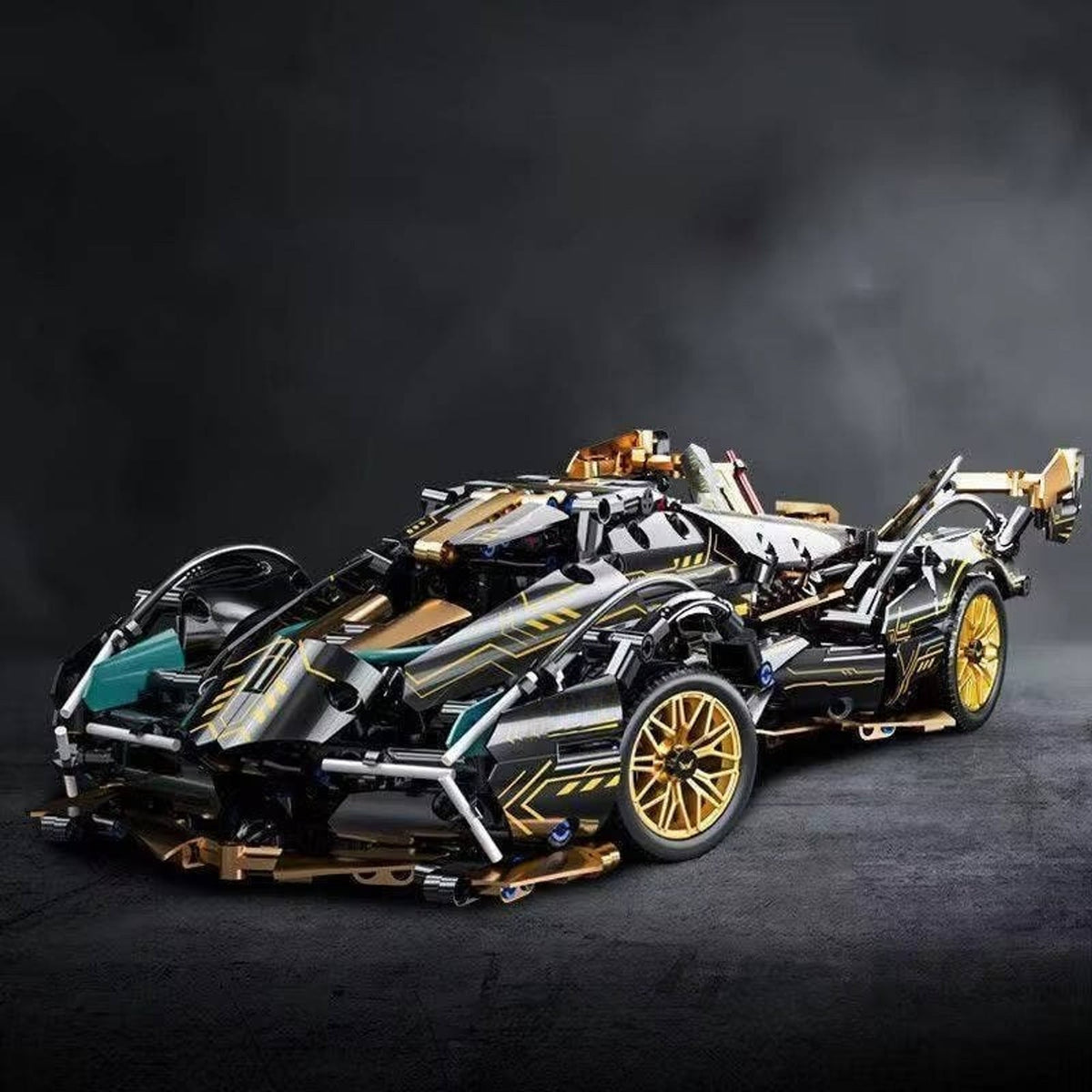 Model supercar with turquoise details and gold wheels