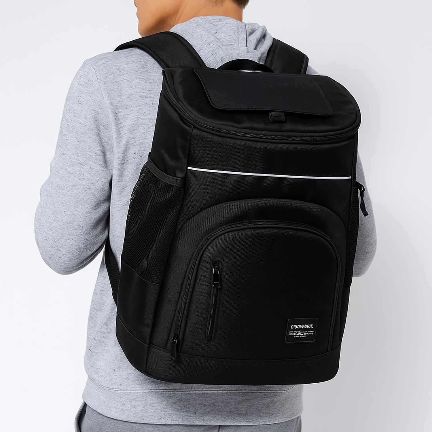 Black 30L insulated cooler backpack with thermal Oxford fabric, zipper closure, soft handle and straps, ideal for travel and outdoor use.