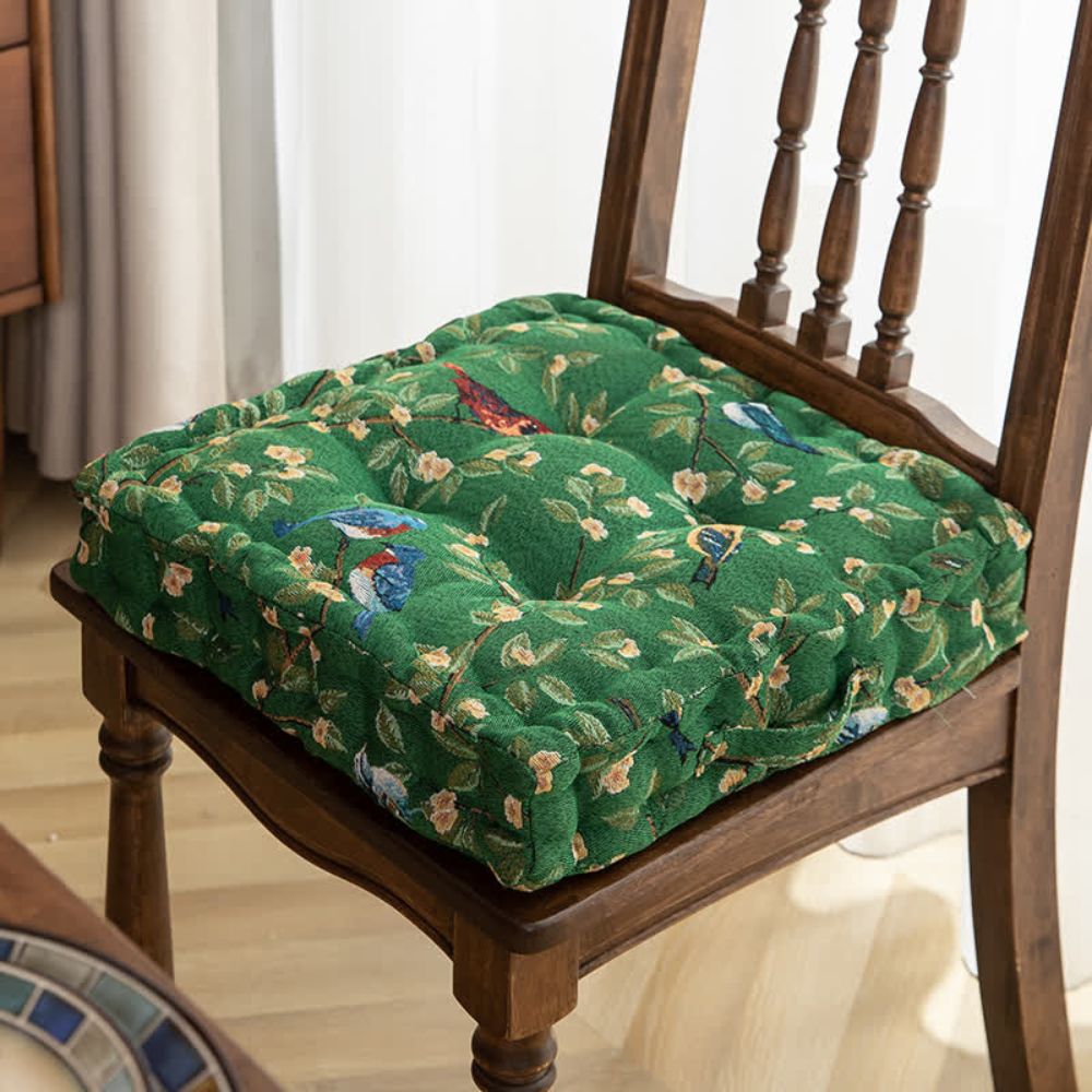 Green floral tufted chair cushion