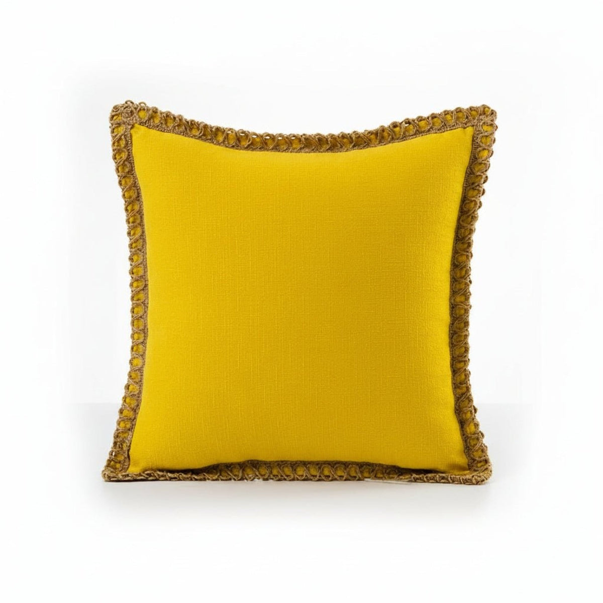 Gold yellow cushions with decorative trim