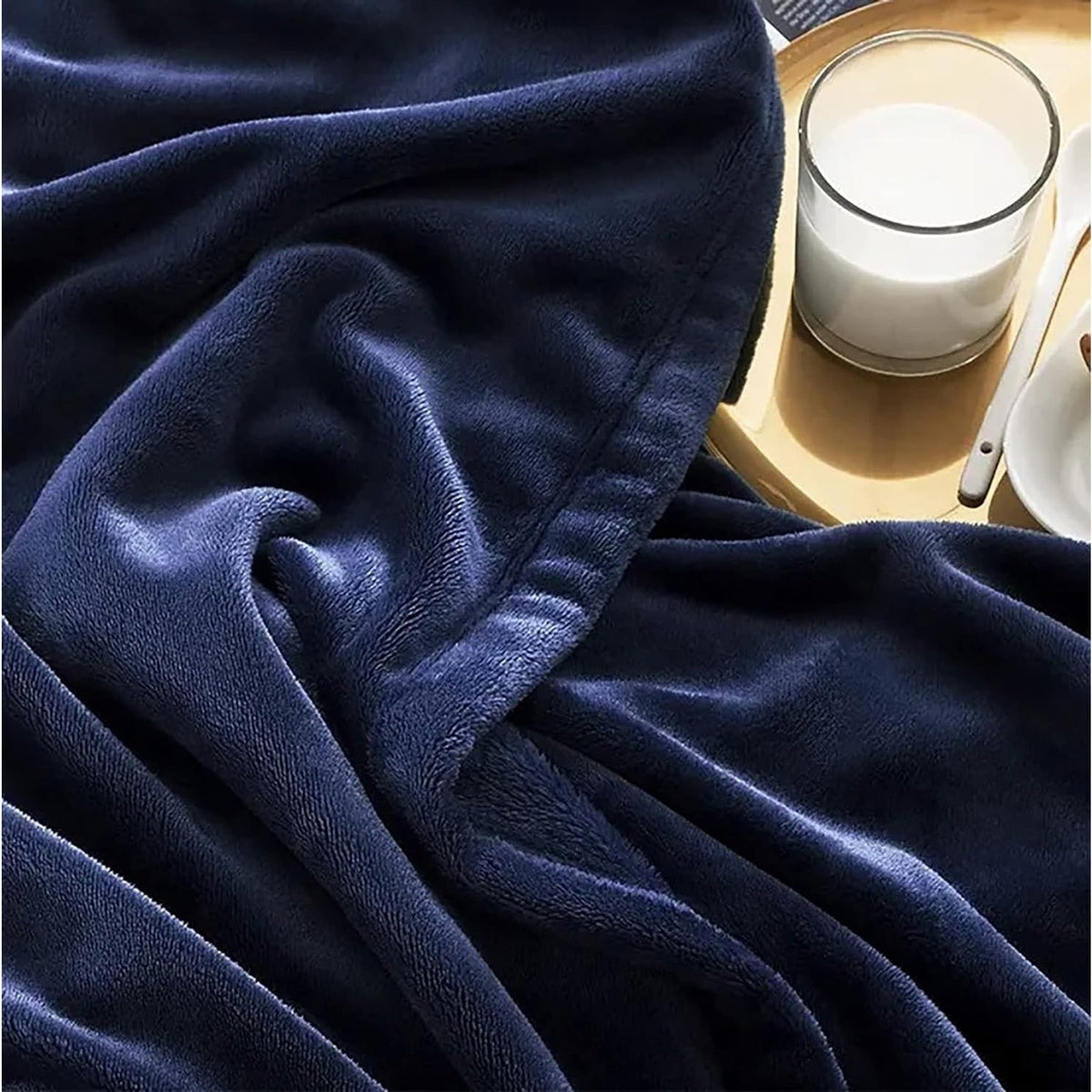 Navy blue fleece blanket texture close-up