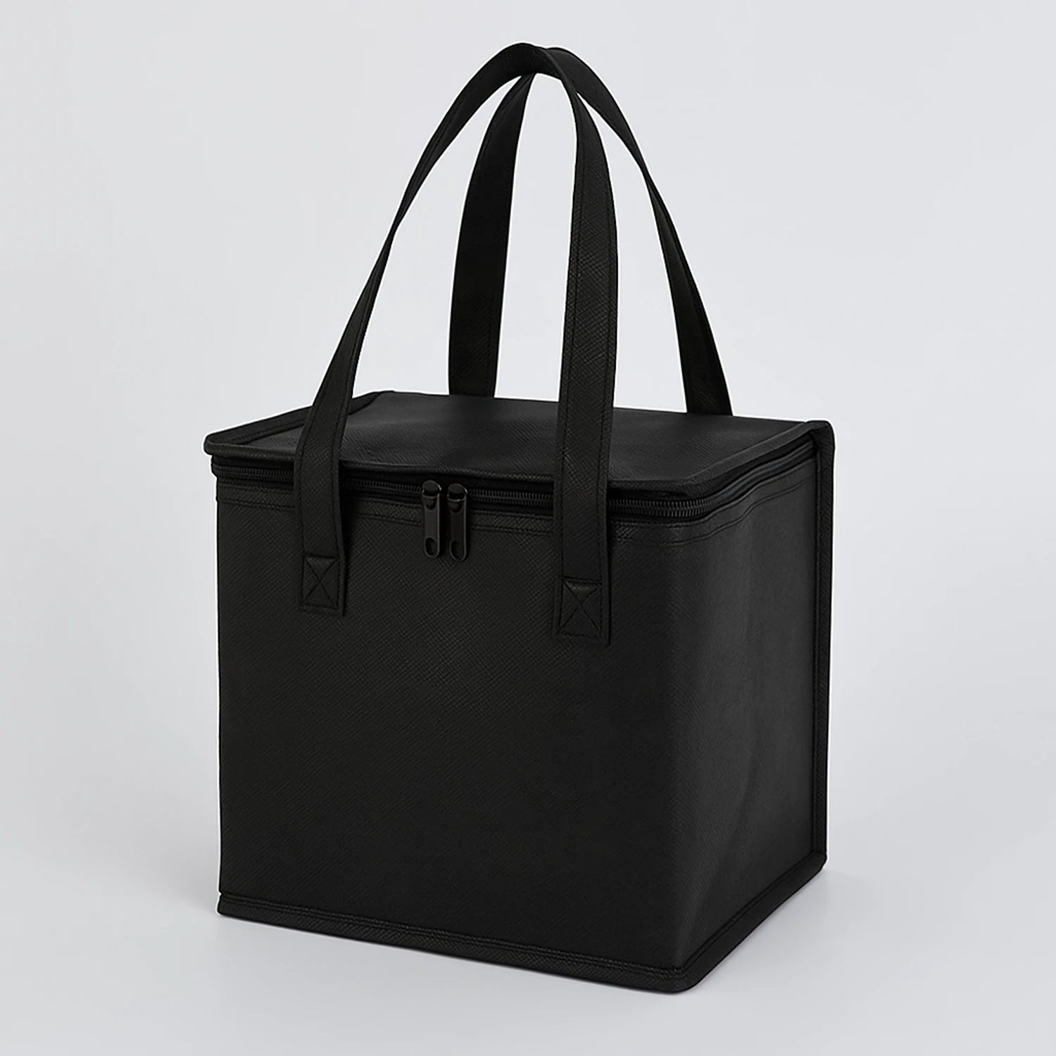Black foldable insulated thermal food bag with aluminium foil lining, zipper closure, and sturdy handles for lunch, groceries, and picnics, available in la