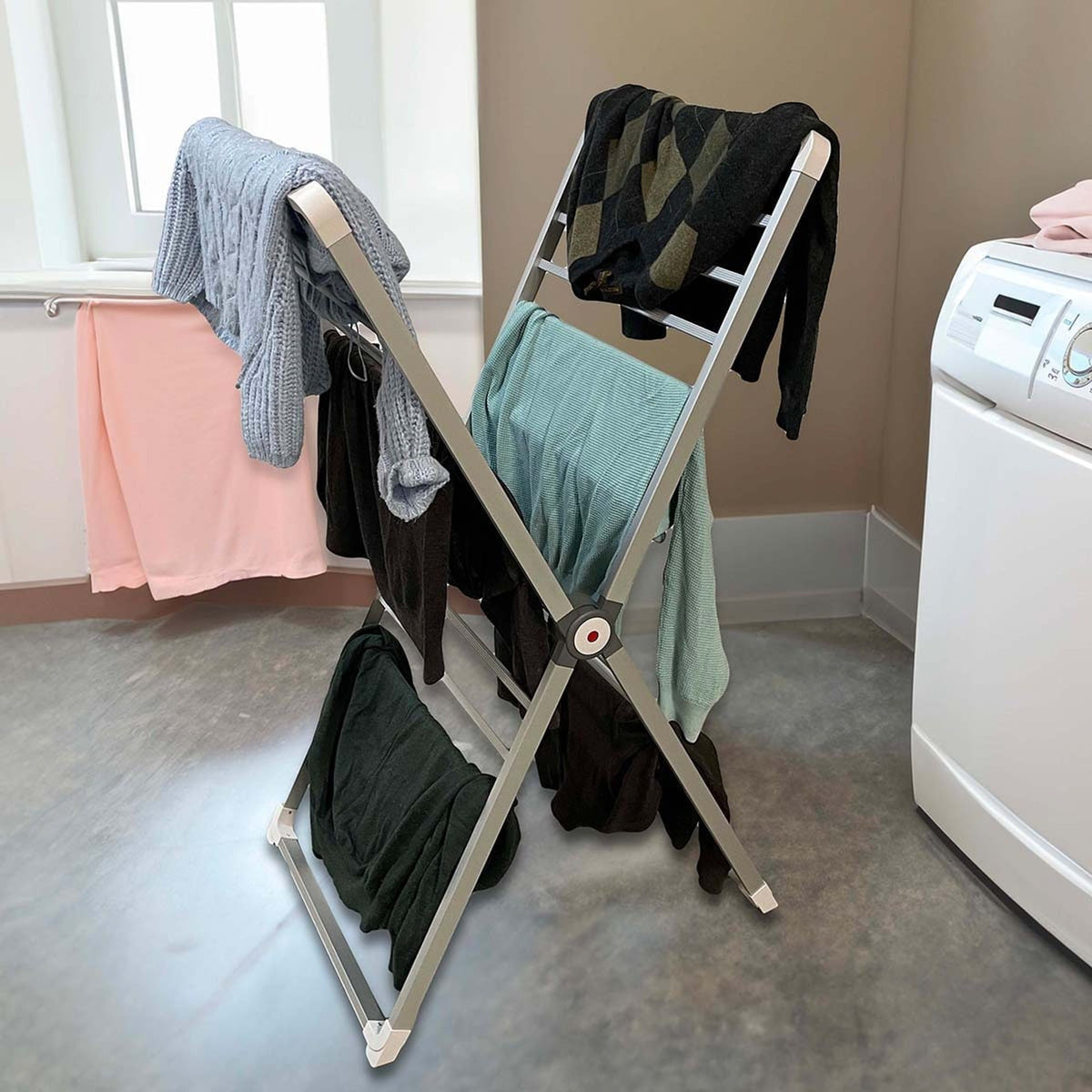 Clothes hanging on the freestanding rack at home
