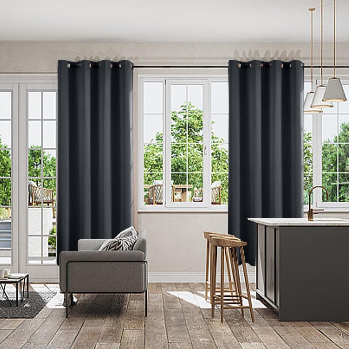 Black eyelet curtains framing a window