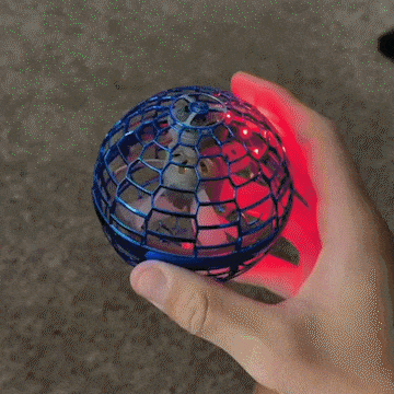 Hand demonstrating the light-up flying ball