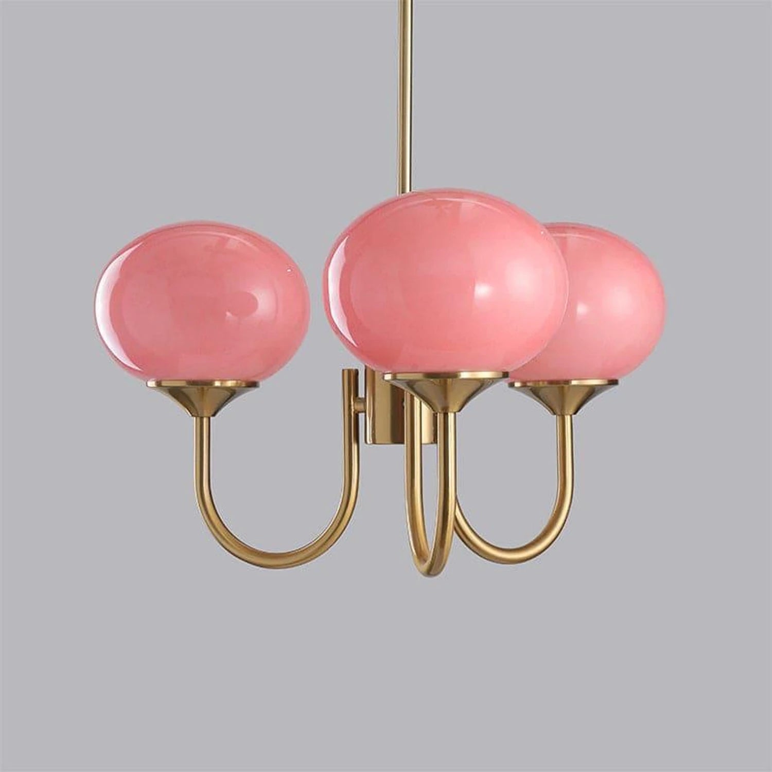 Modern glass ball pendant light with metal finish, suitable for living room or bedroom ceiling lighting.