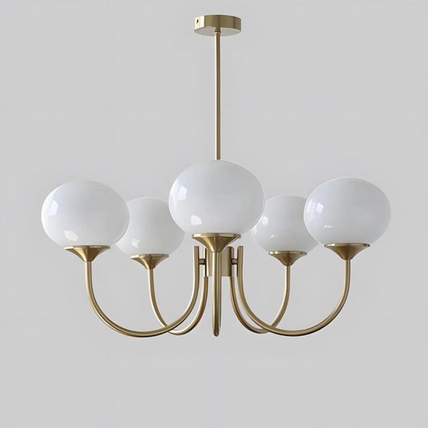 Modern glass ball pendant light with metal finish, suitable for contemporary dining rooms and bedrooms.