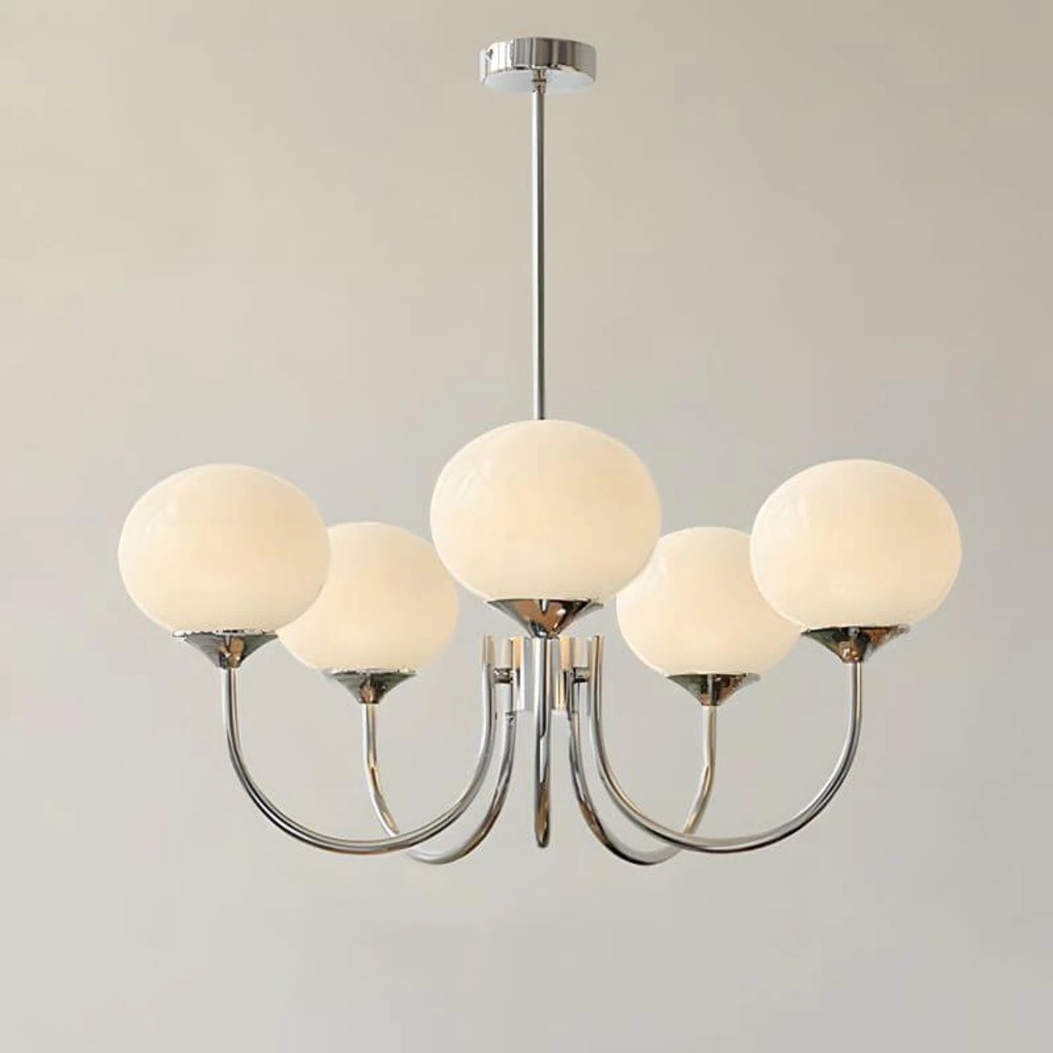 Modern glass ball pendant light with metal finish, suitable for living room or bedroom ceiling lighting.