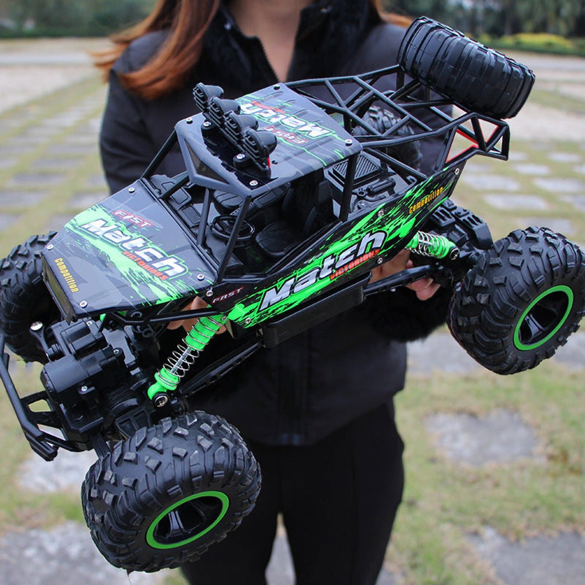 Green-accented 4x4 RC off-road car