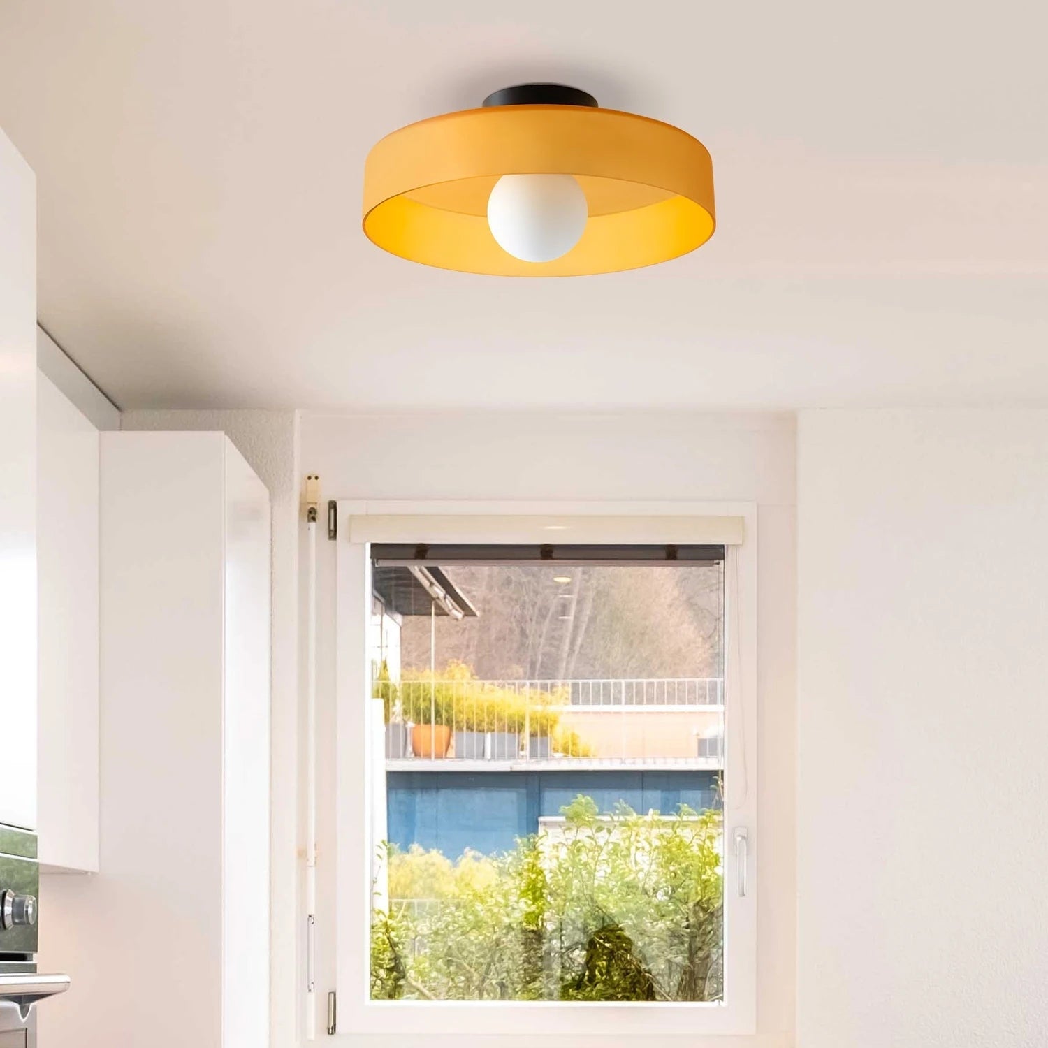Minimalist modern flush mount ceiling light in olive green with a low-profile silhouette for soft, diffused lighting in bedrooms and hallways.