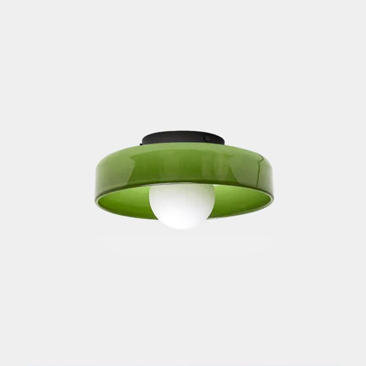 Minimalist modern flush mount ceiling light with a low profile, providing a soft, diffused glow.