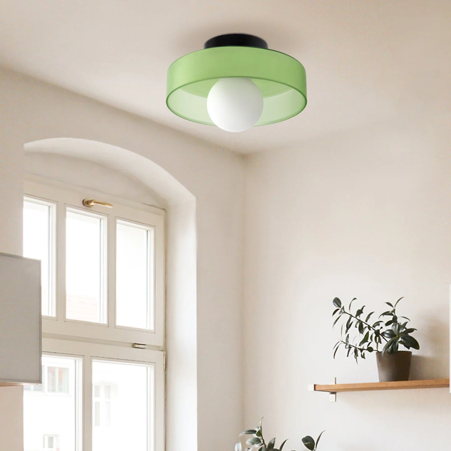Minimalist modern flush mount ceiling light in olive green with a low-profile silhouette for soft, glare-free illumination in bedrooms and hallways.