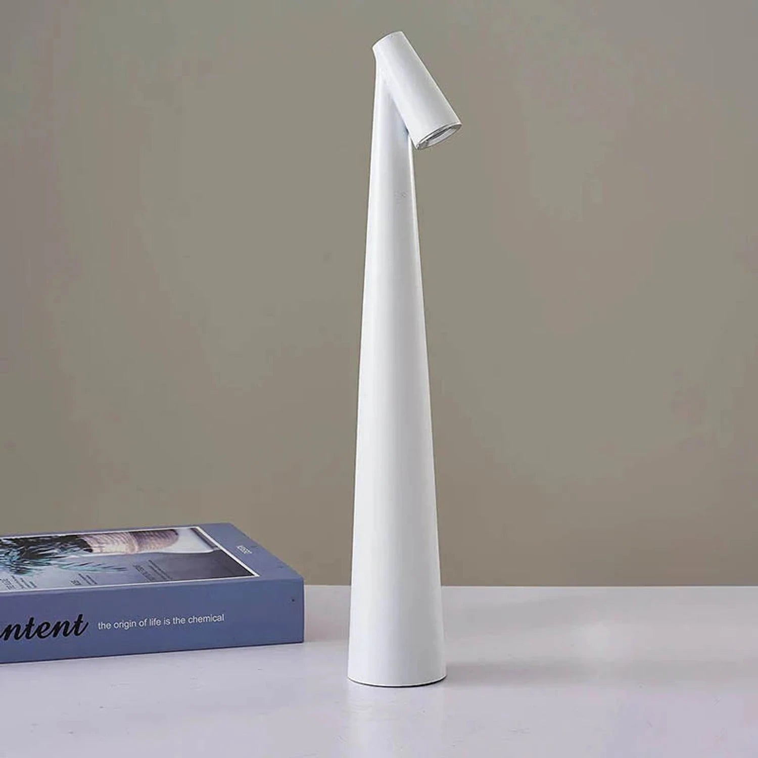 Minimalist Nordic cordless aluminium LED table lamp with touch-dimmable light in various colours, perfect for bedside or living room decor.
