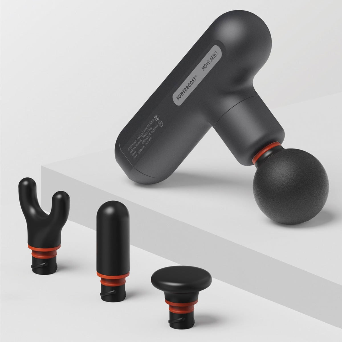 Move Aero massage gun with four interchangeable heads