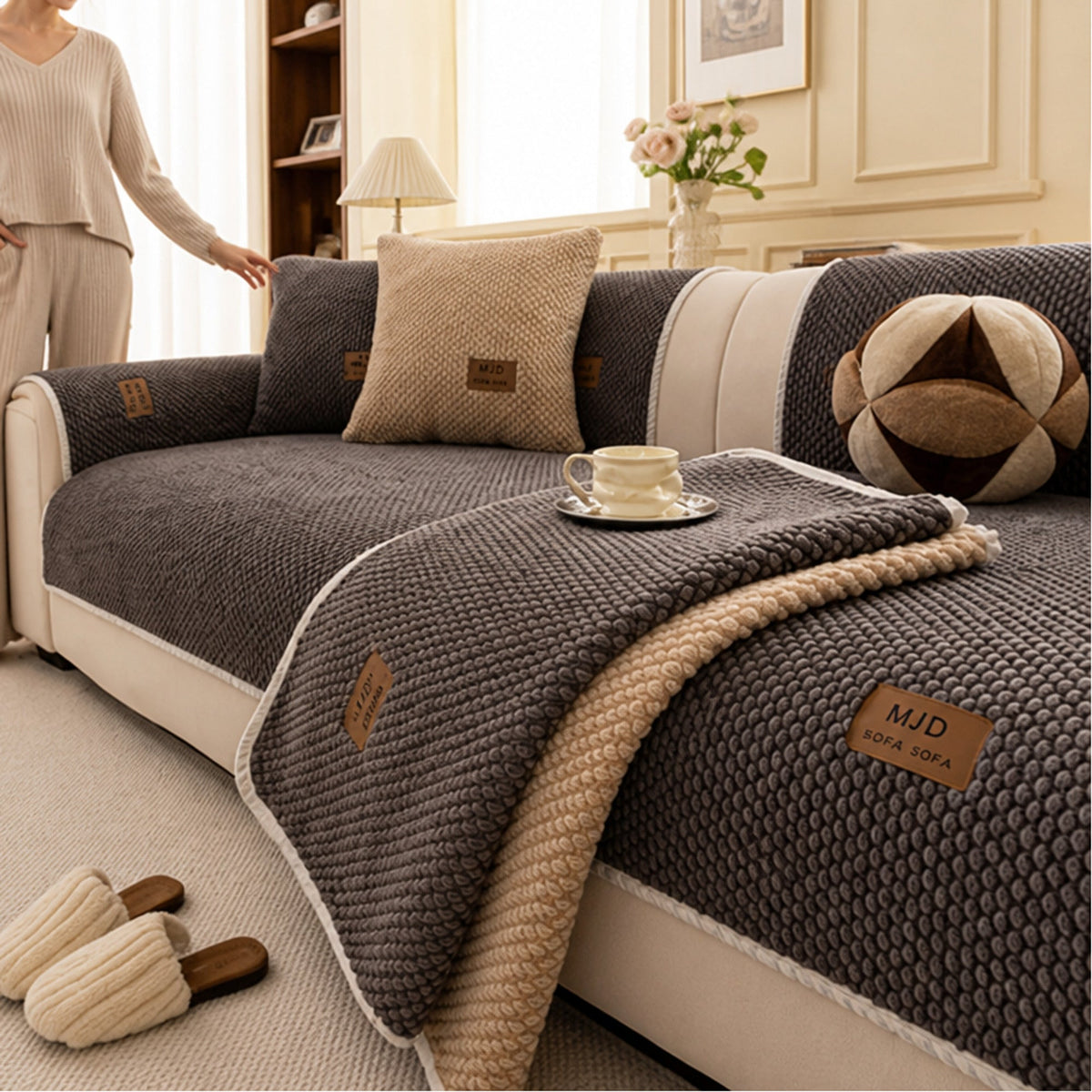 Dark grey chenille sofa cover folded