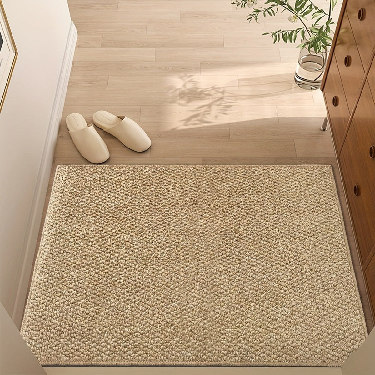 Camel natural fibre mat beside an entrance door