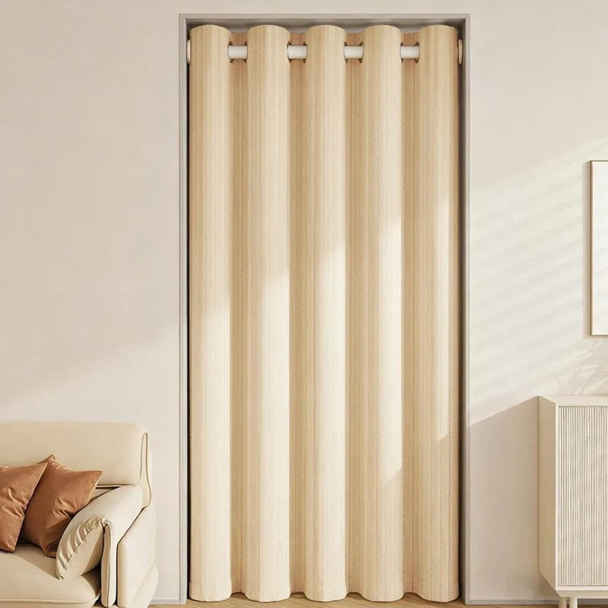 Light brown thermal curtain closed across an opening