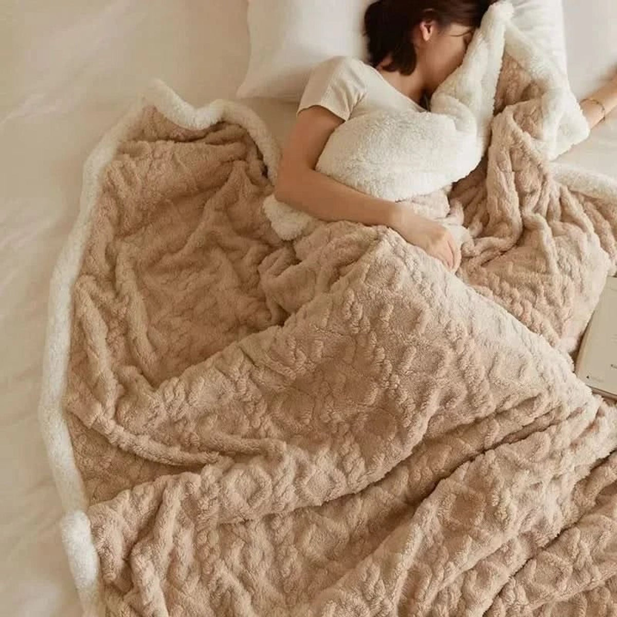 Beige textured blanket with light reverse
