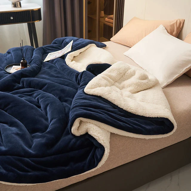 Navy blue fleece blanket with sherpa lining