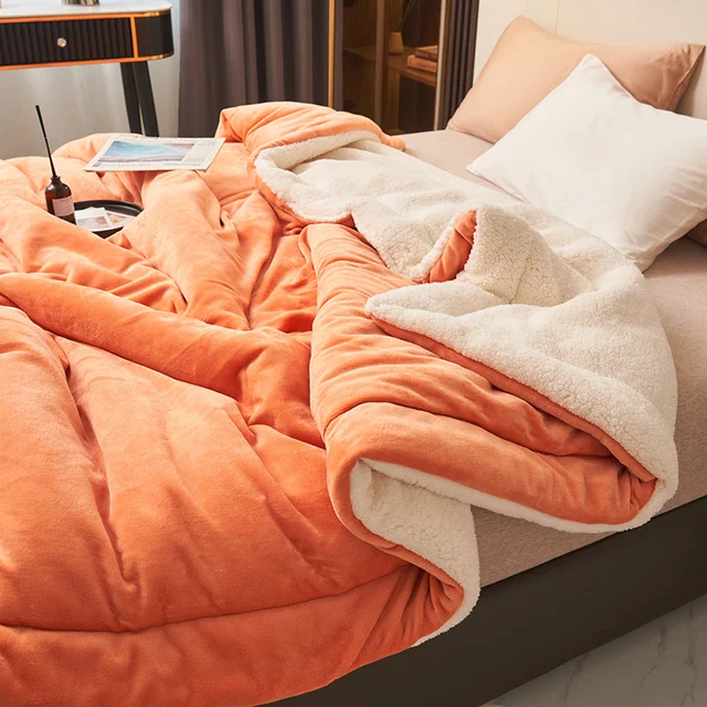 Orange fleece blanket with sherpa lining