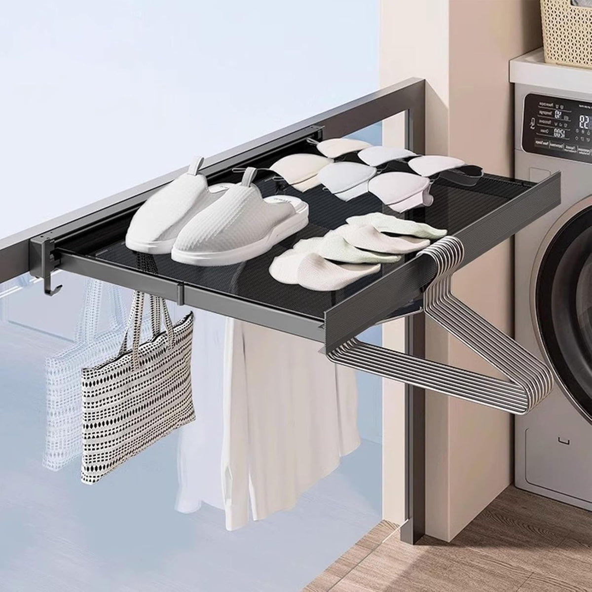 Grey pull-out mesh drying shelf holding slippers and socks