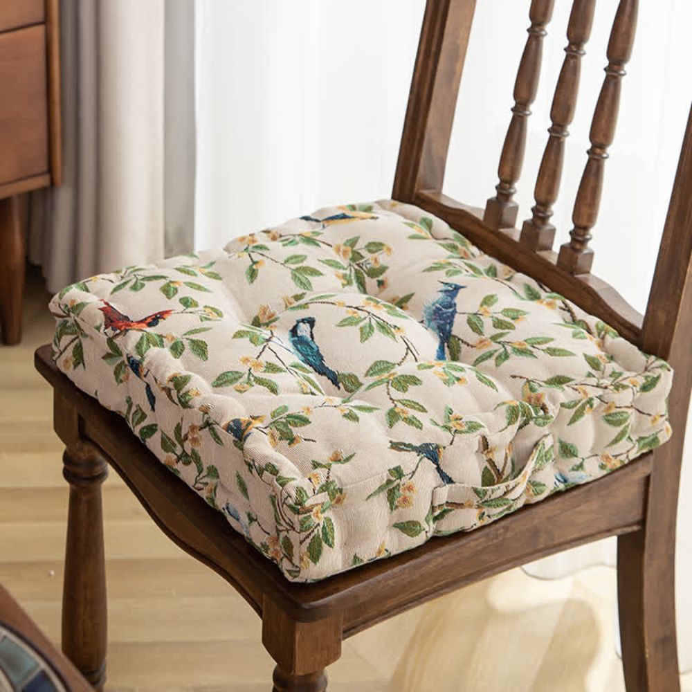 Beige floral tufted chair cushion