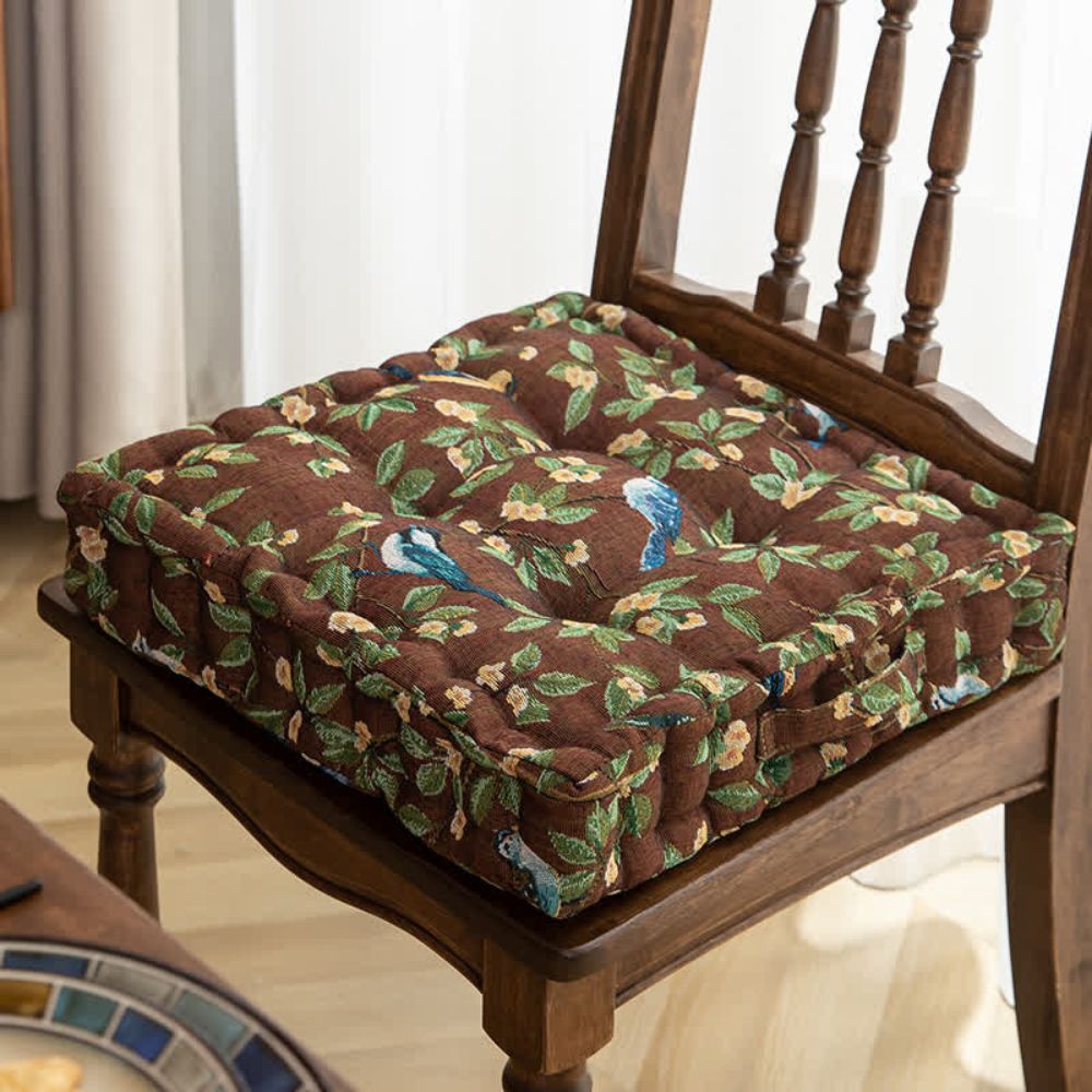 Brown floral tufted chair cushion