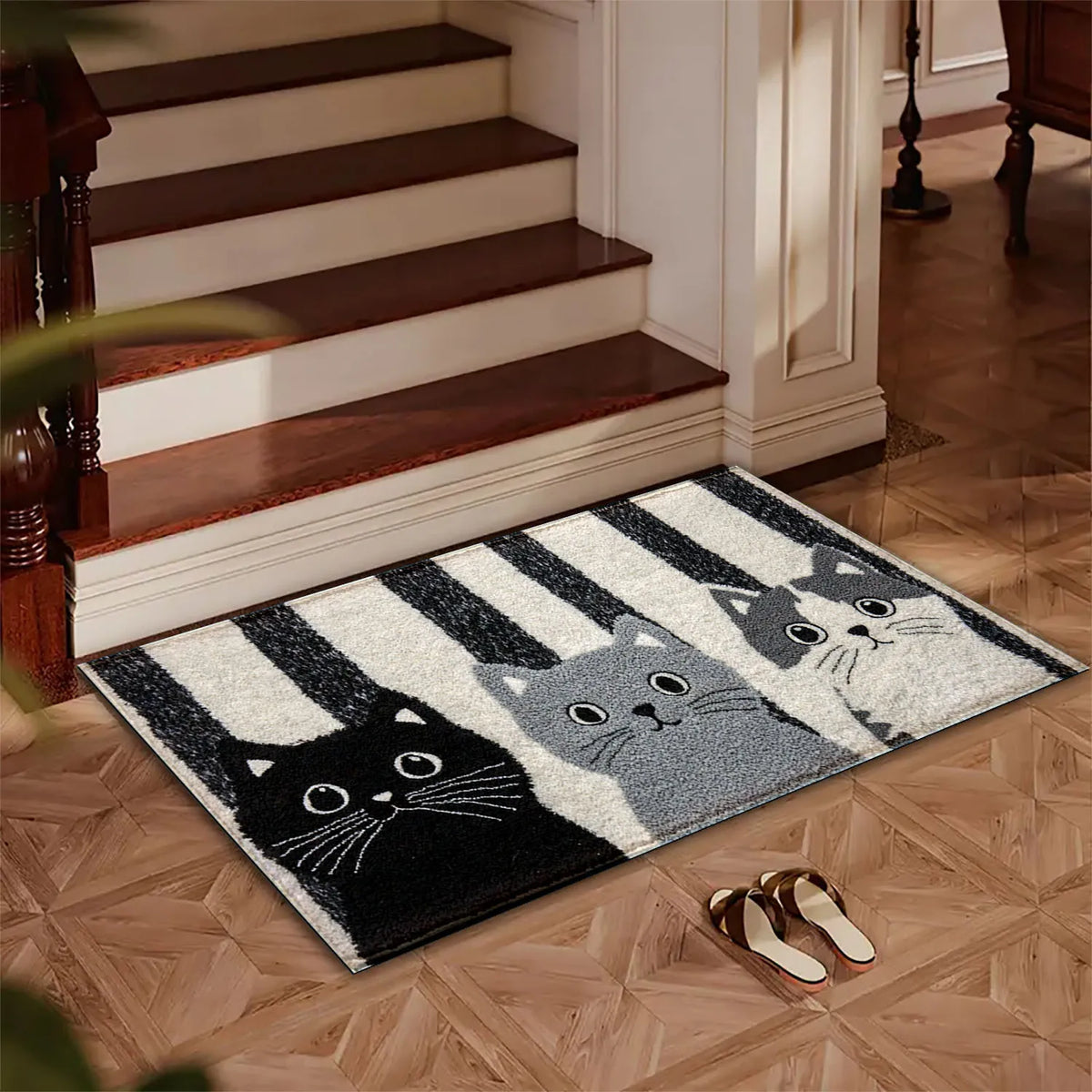 Cat-patterned mat beside stairs