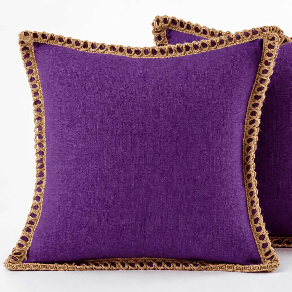 Purple cushions with crochet trim