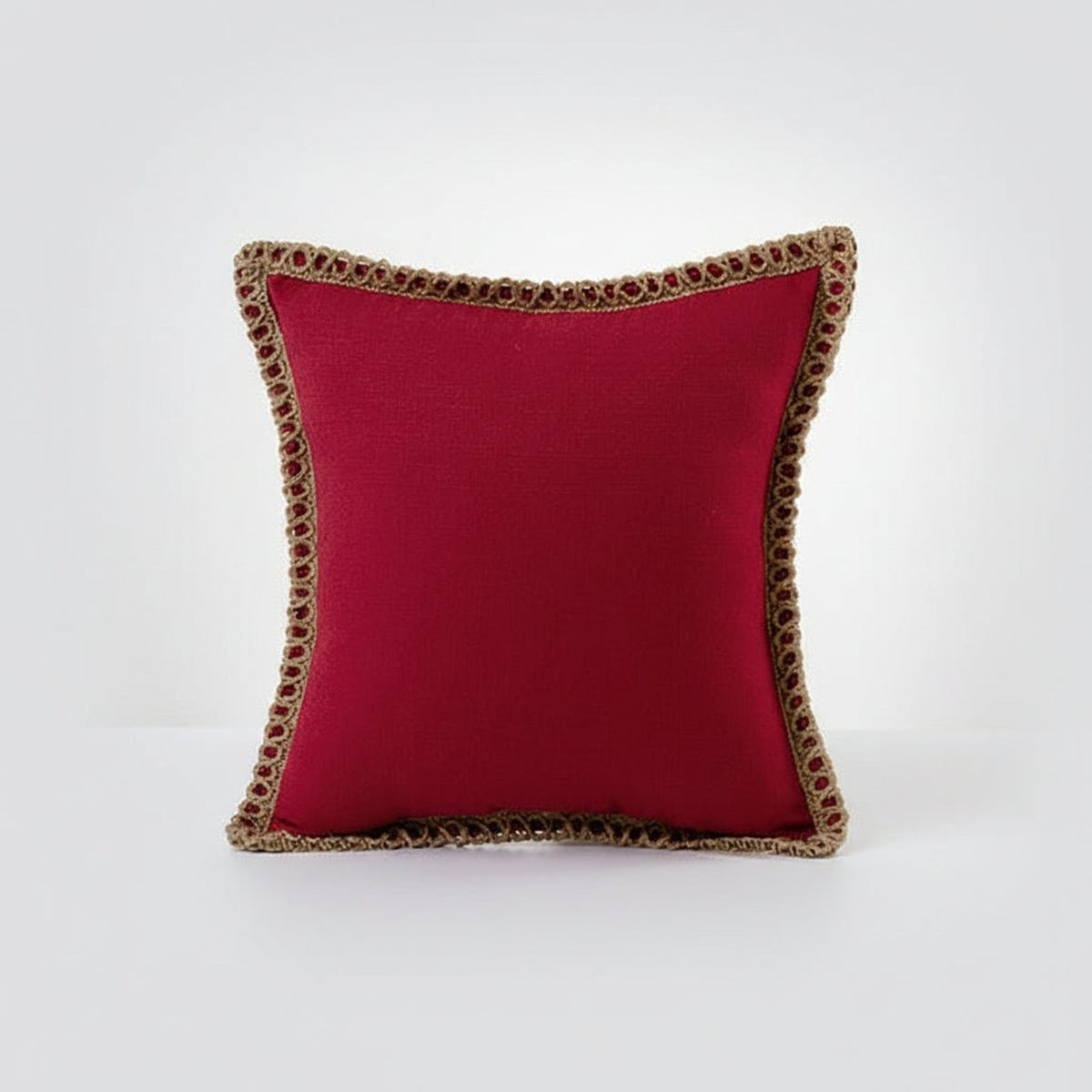 Red square cushions with crochet trim