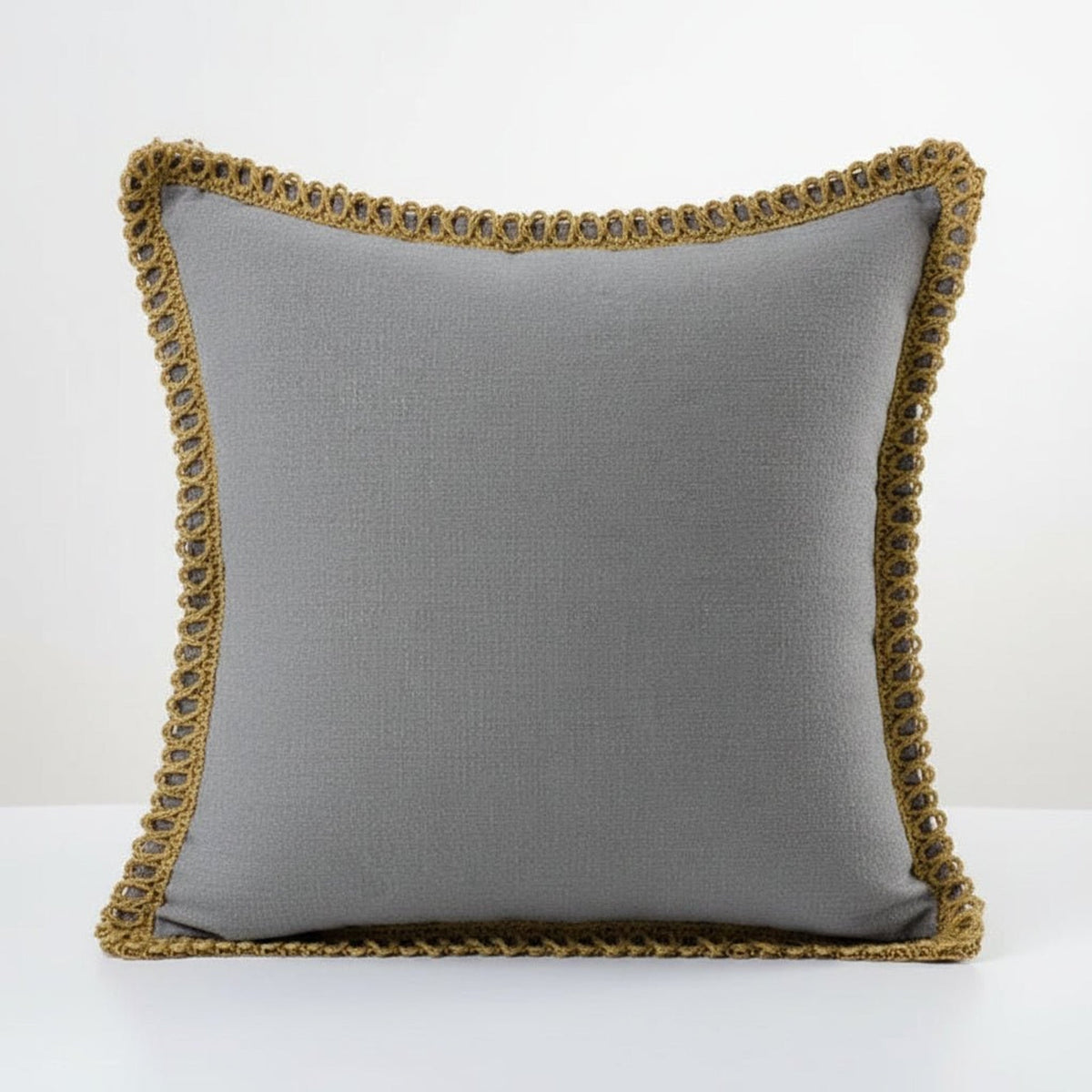 Slate grey cushions with decorative trim