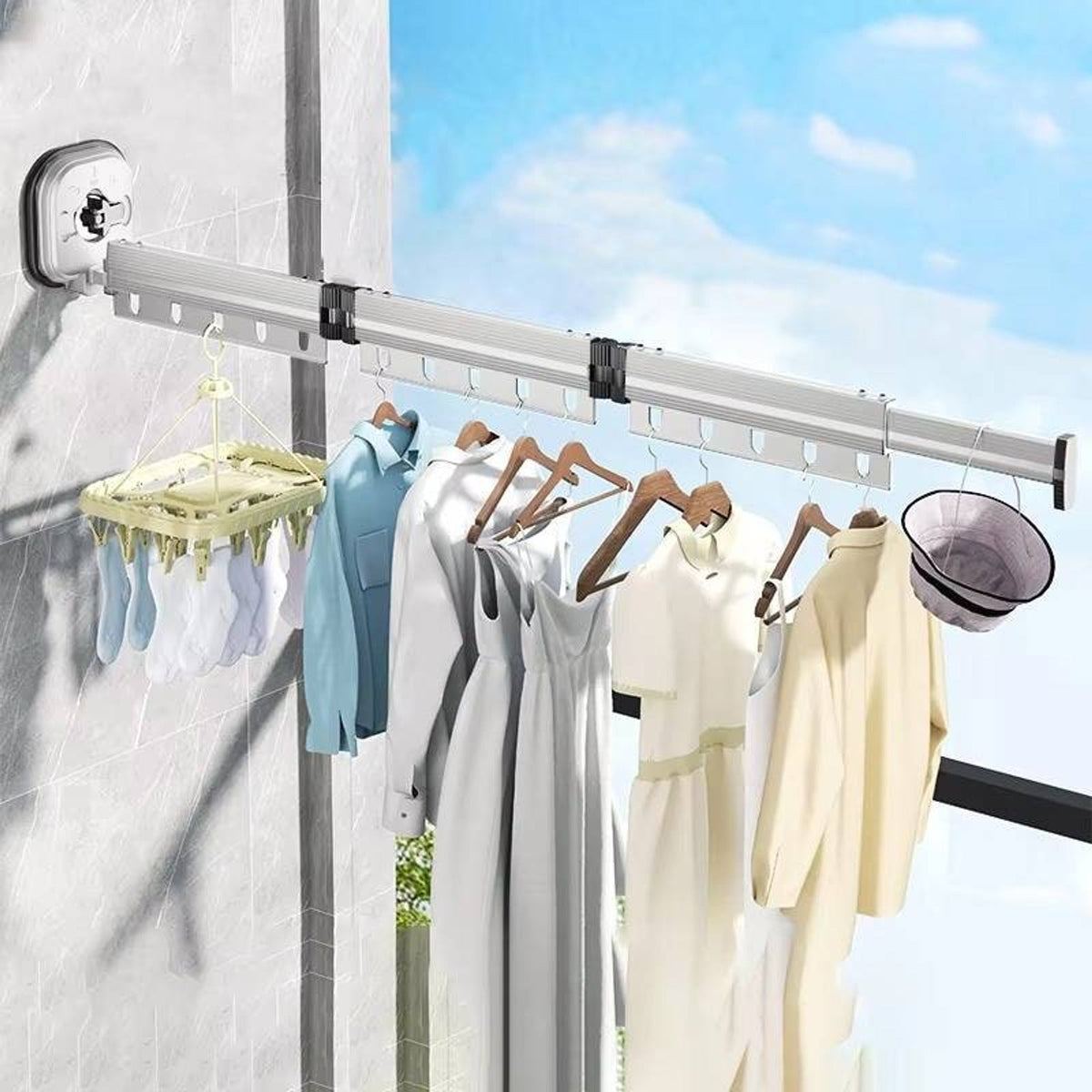 Grey suction-mounted drying rack with arm straightened
