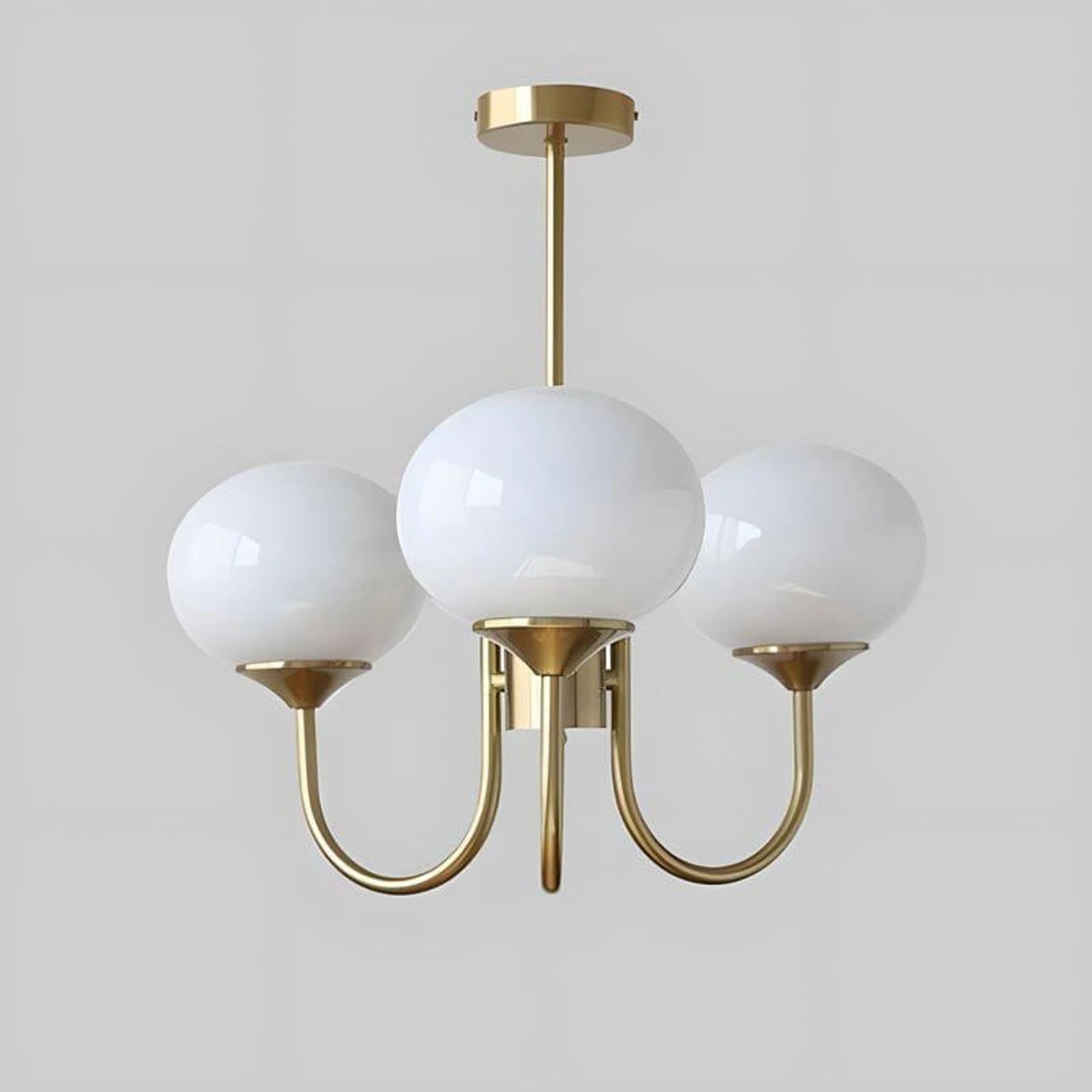 Modern glass ball pendant light with metal finish, suitable for living room or bedroom ceiling lighting.