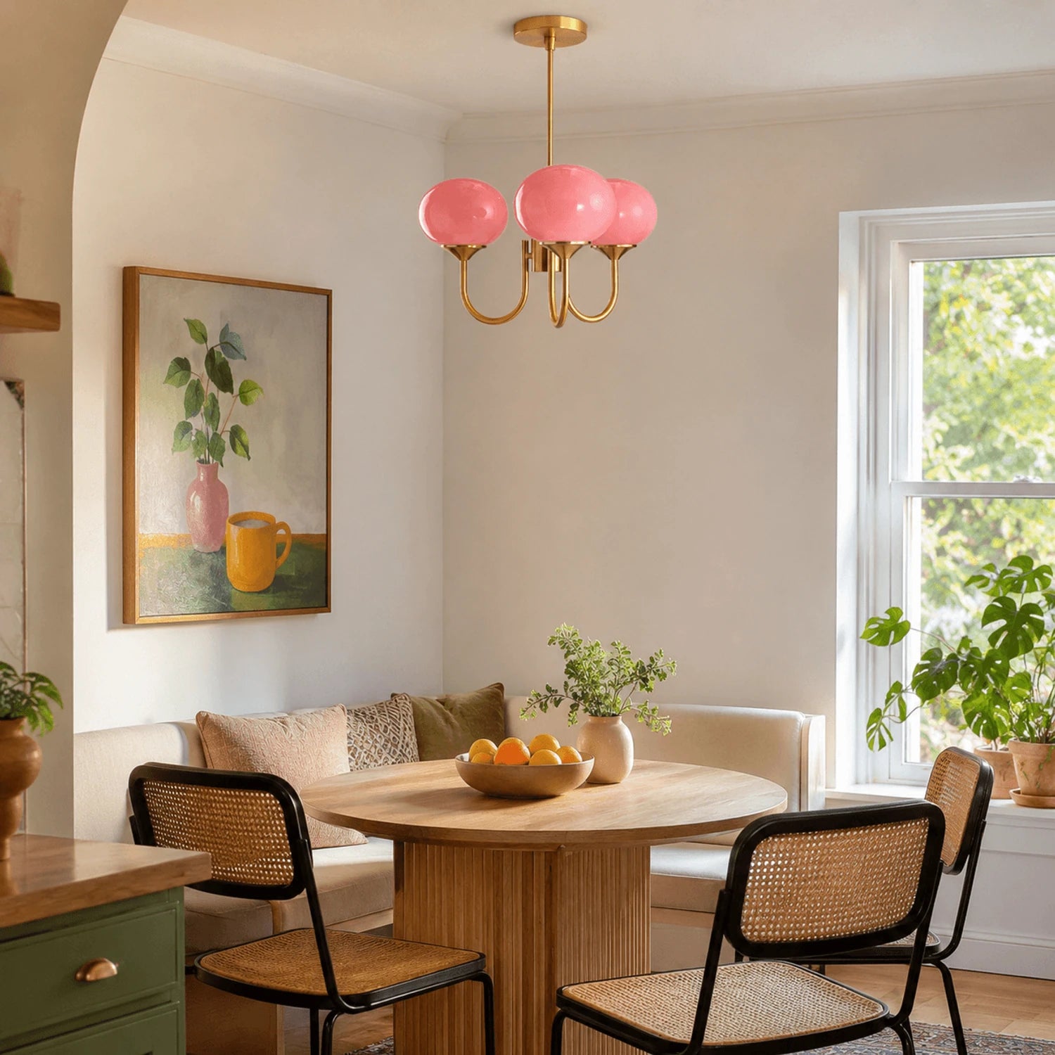 Modern glass ball pendant light with metal finish, suitable for living rooms and bedrooms, available in 3 or 5-light configurations.