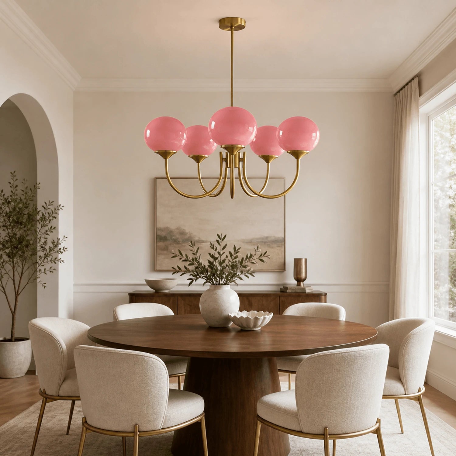 Modern glass ball pendant light with metal finish, suitable for living room or bedroom ceiling lighting.