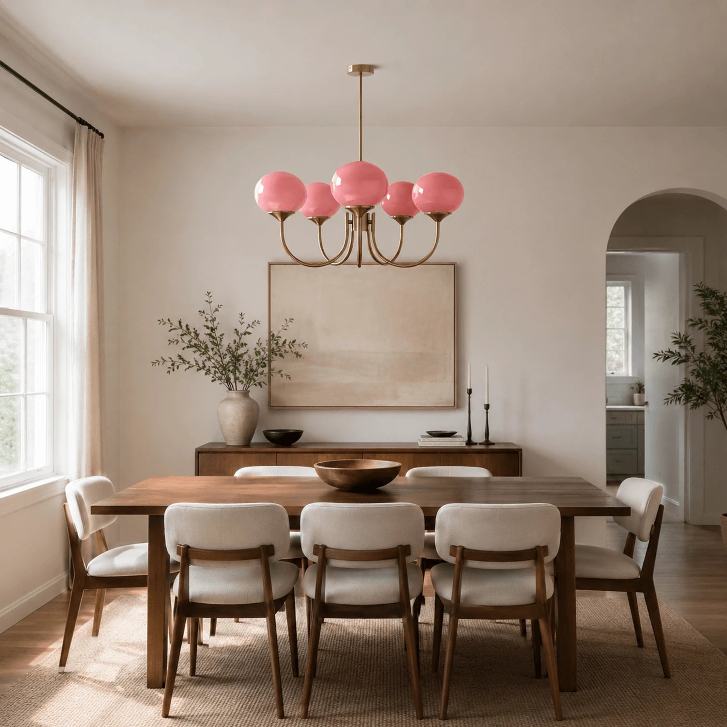 Modern glass ball pendant light with metal finish, suitable for living rooms and bedrooms, available in 3 or 5-light configurations.