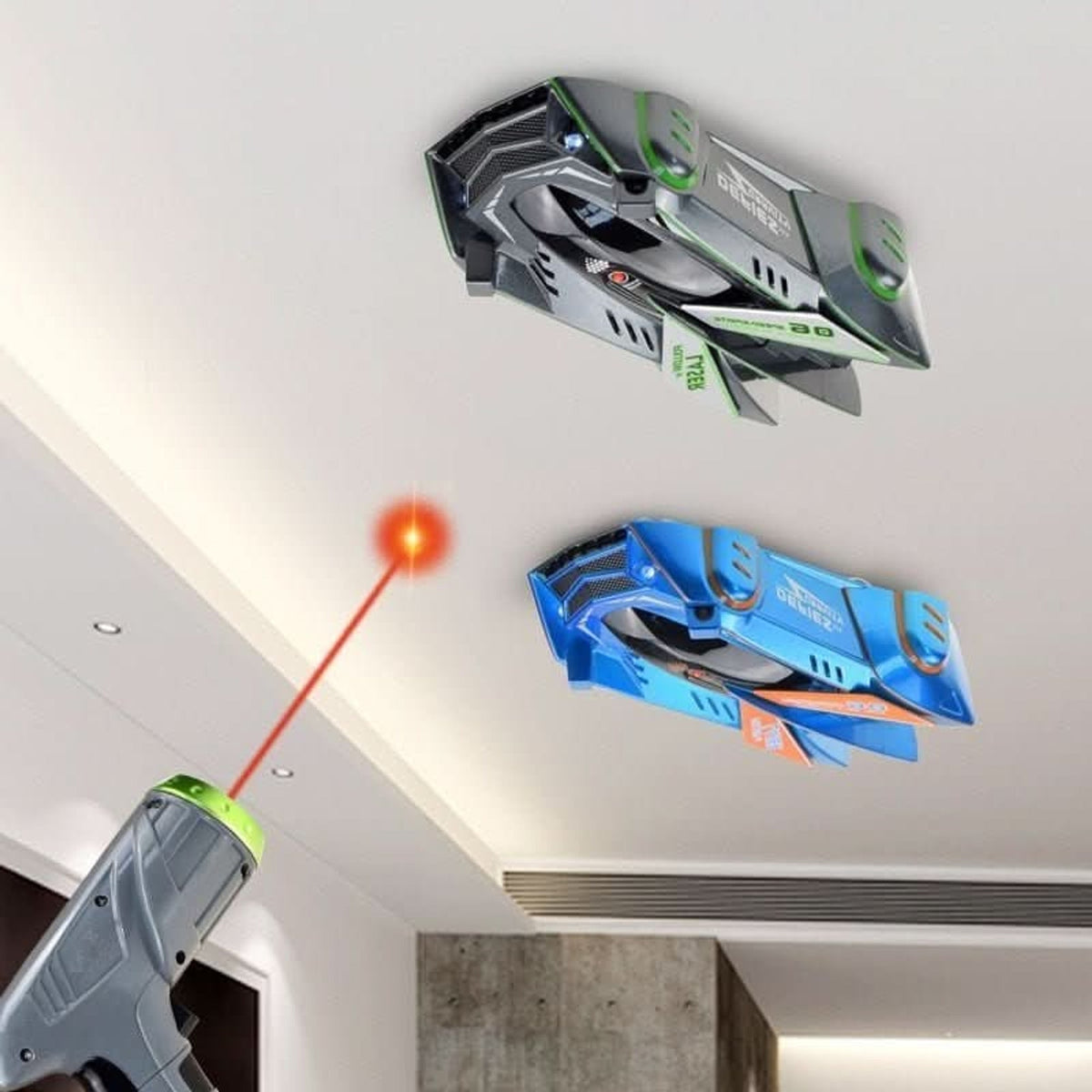 Grey and blue wall-climbing cars shown on a ceiling