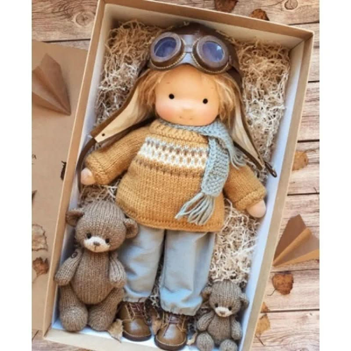 Blonde cloth doll in aviator hat and goggles