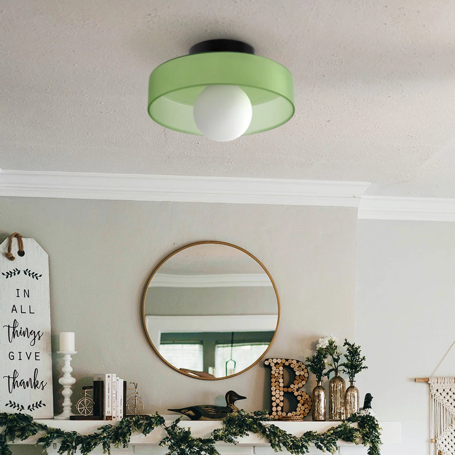 Minimalist modern flush mount ceiling light in olive green with a low-profile design for soft, glare-free illumination in bedrooms and hallways.