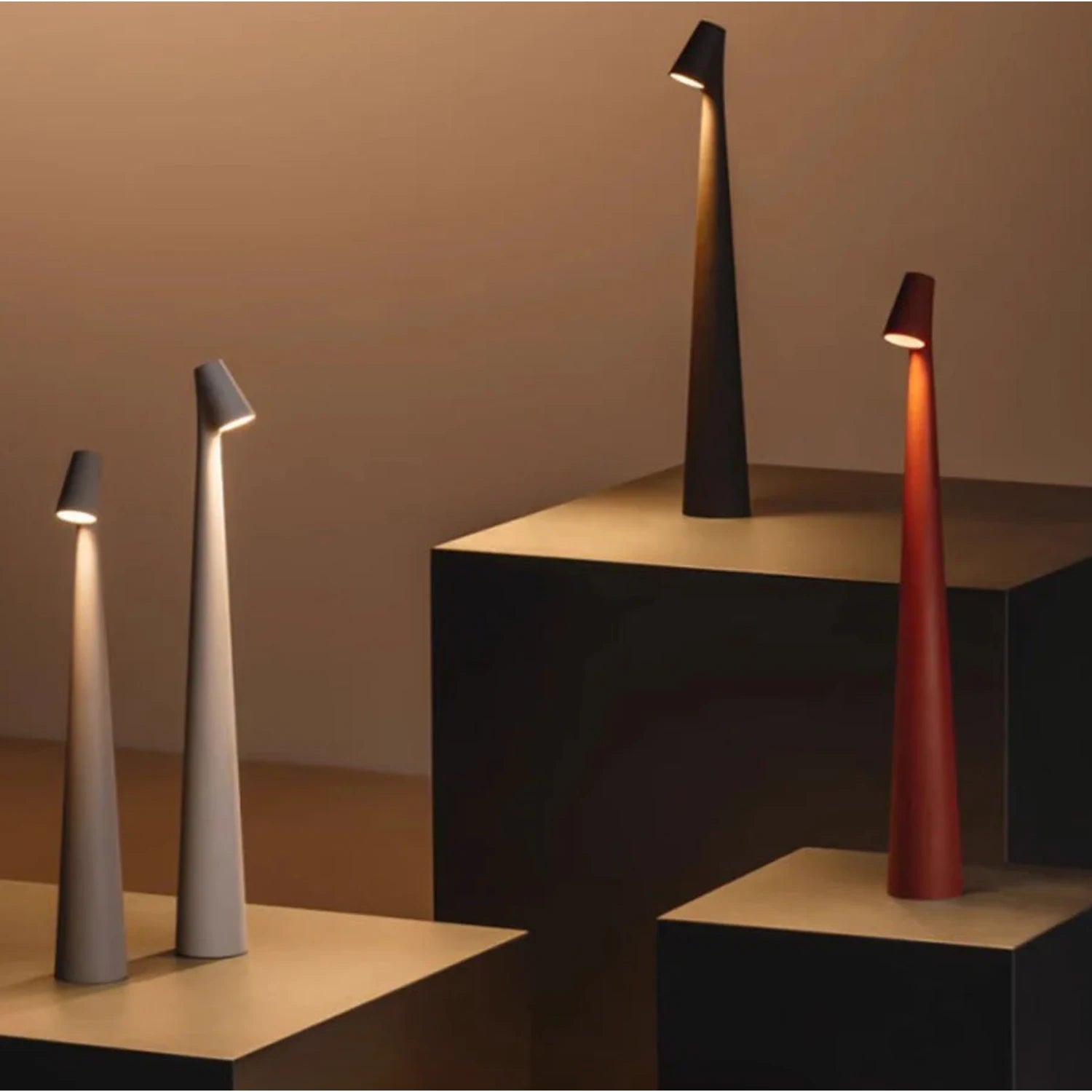 Nordic minimalist cordless aluminium LED table lamp with touch-dimmable light in various colours for modern bedroom or living room decor.