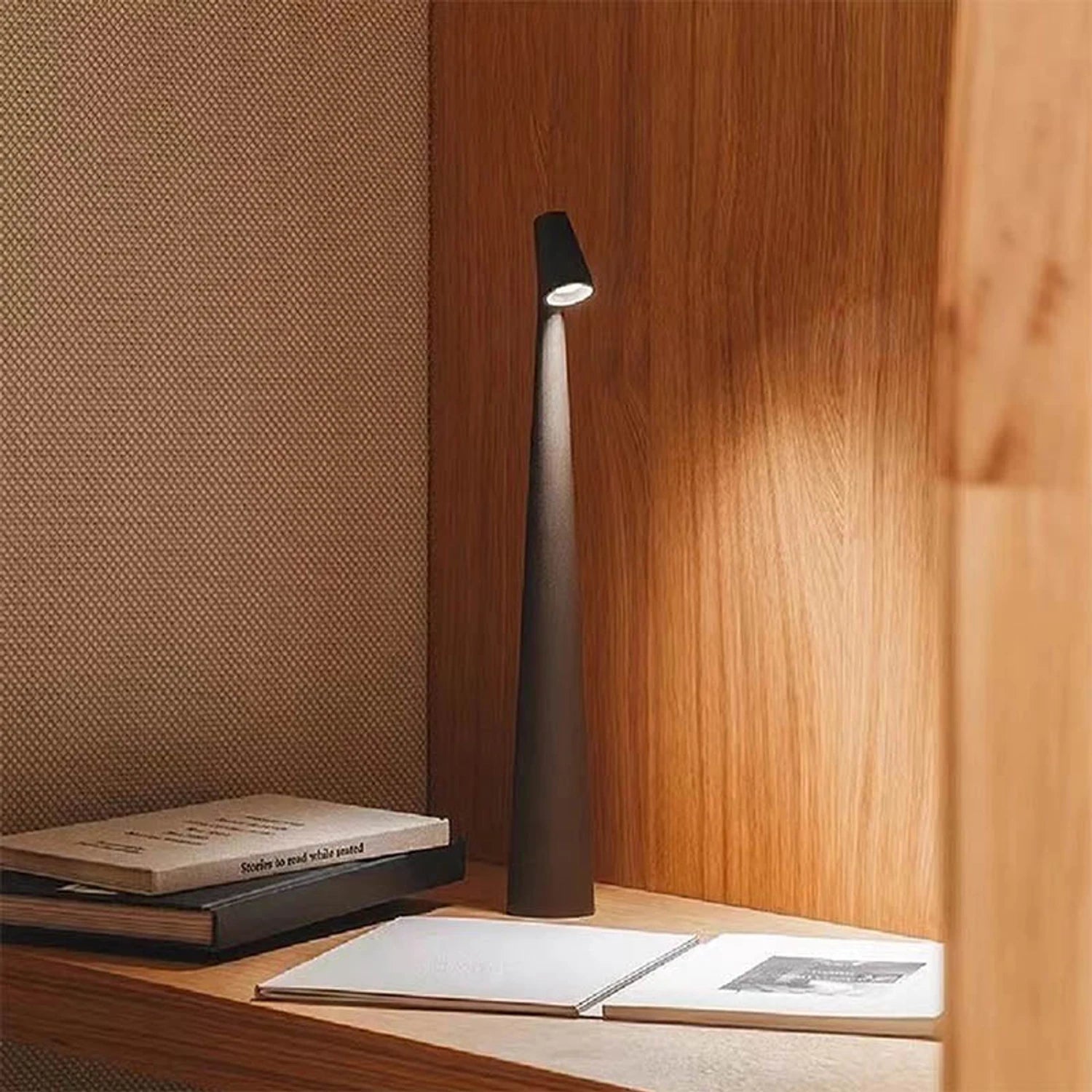 Minimalist Nordic cordless aluminium LED table lamp with touch-dimmable light in various colours for bedside or living room decor.