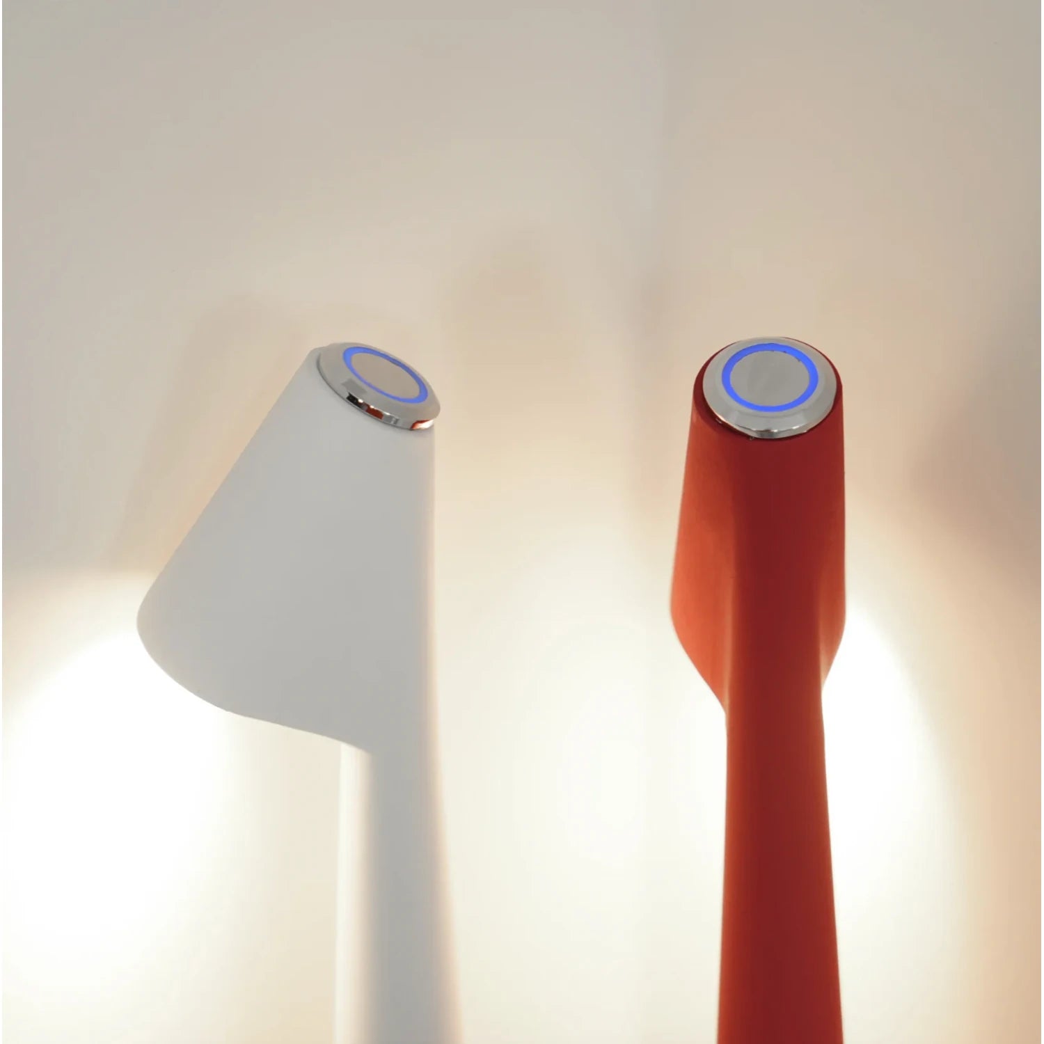 Nordic minimalist cordless aluminium LED table lamp with touch-dimmable light in various colours for bedroom or living room decor.