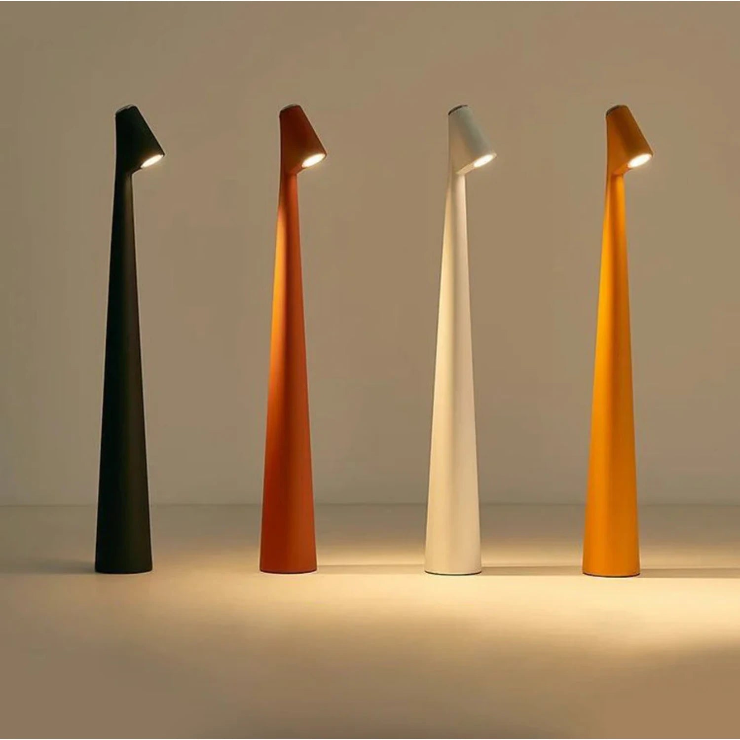 Minimalist Nordic cordless aluminium LED table lamp with touch-dimmable light, available in multiple colours and sizes for modern bedside or desk use.