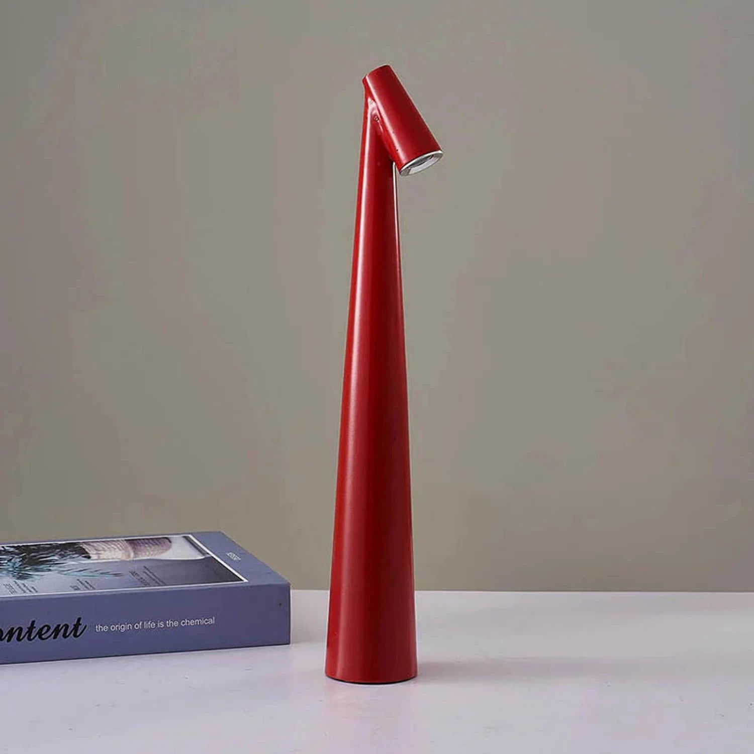 Nordic minimalist cordless aluminium LED table lamp with touch-dimmable light in various colours for bedroom or living room decor.
