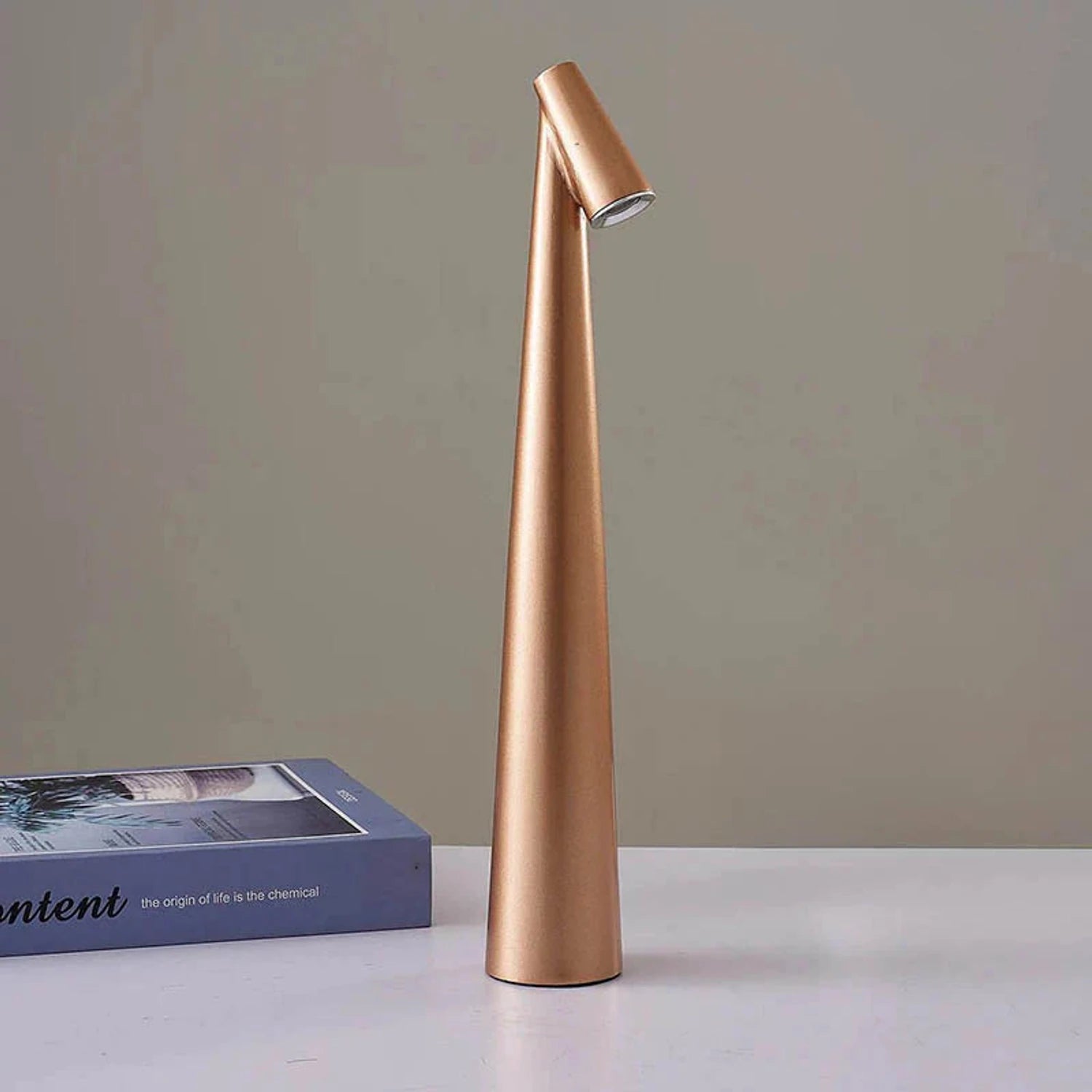 Nordic minimalist cordless aluminium LED table lamp with touch-dimmable light in various colours for bedroom and living room decor.