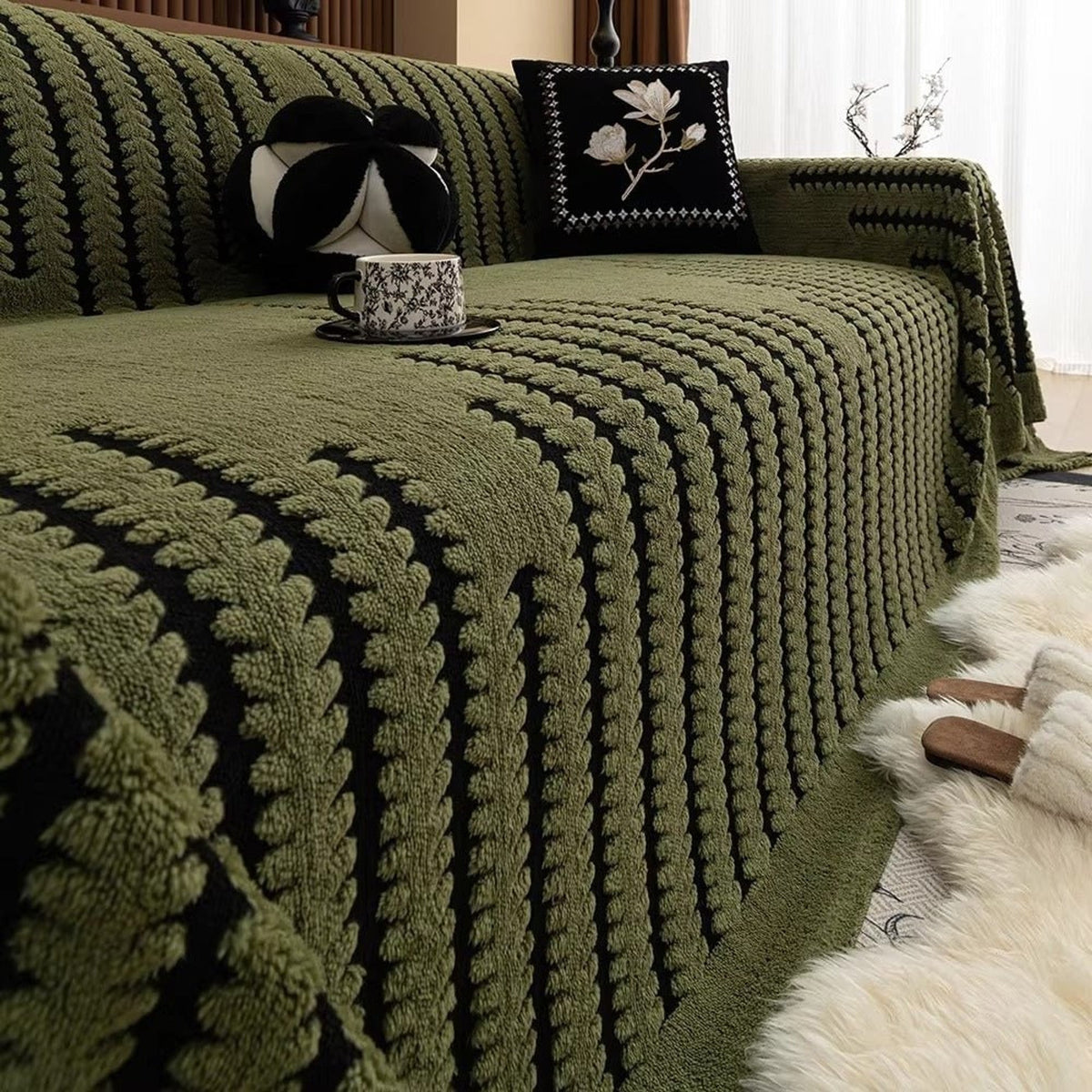 Olive green tufted sofa blanket with dark stripes