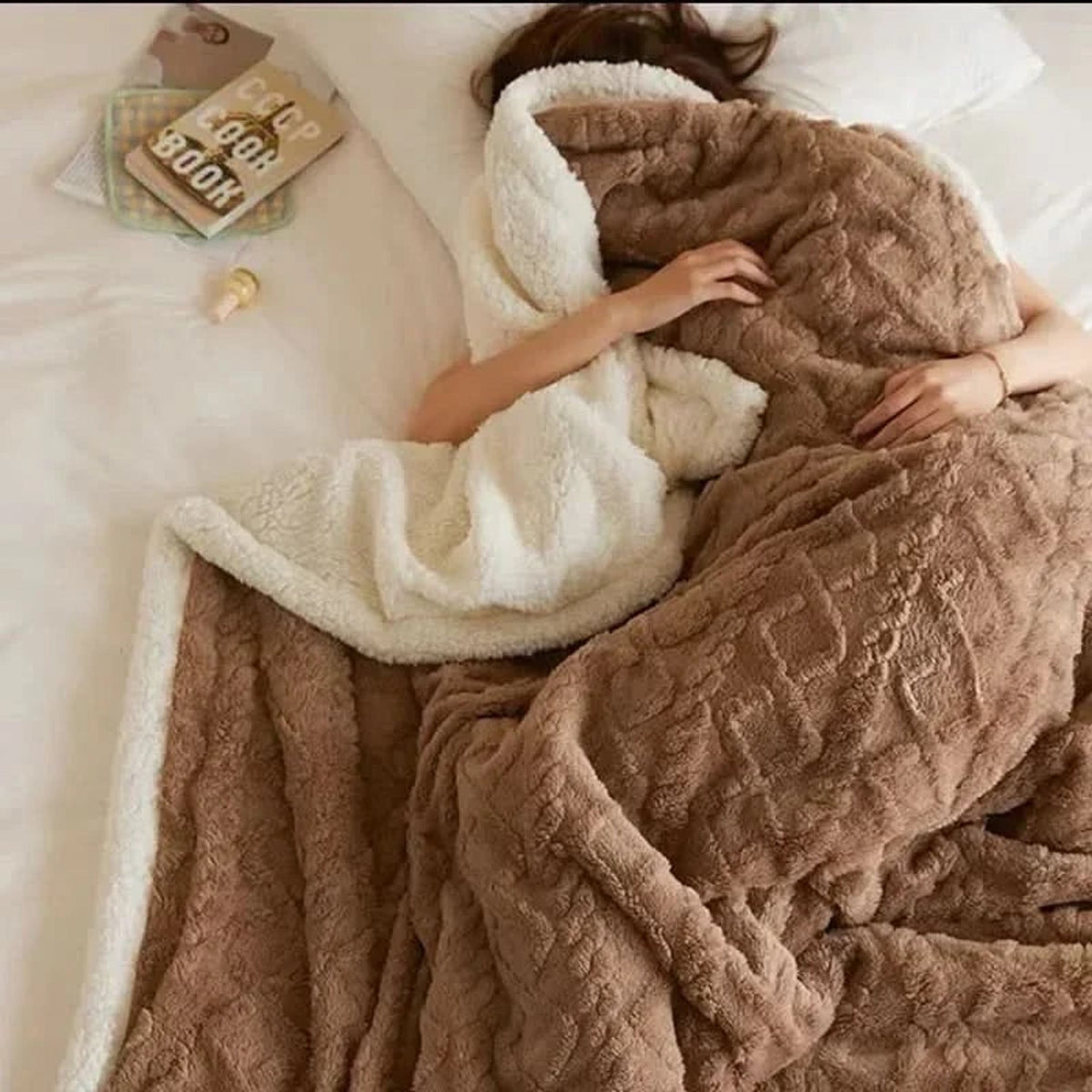 Brown textured blanket with contrasting light reverse